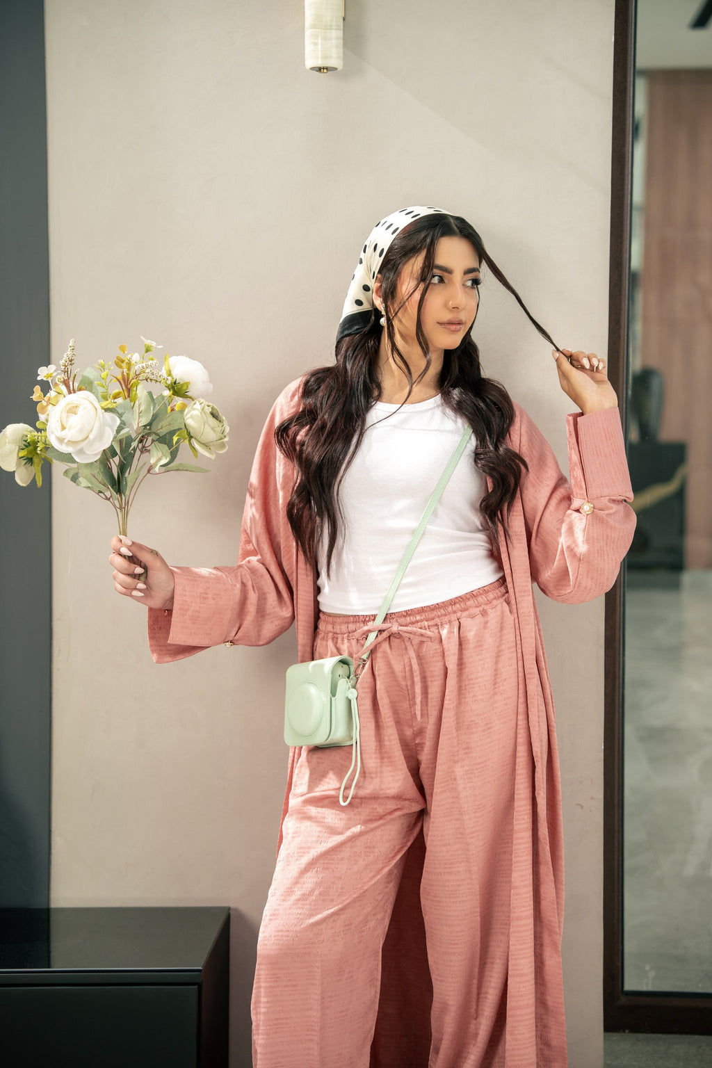 The Blush kimono worn open over the matching wide-leg trousers.