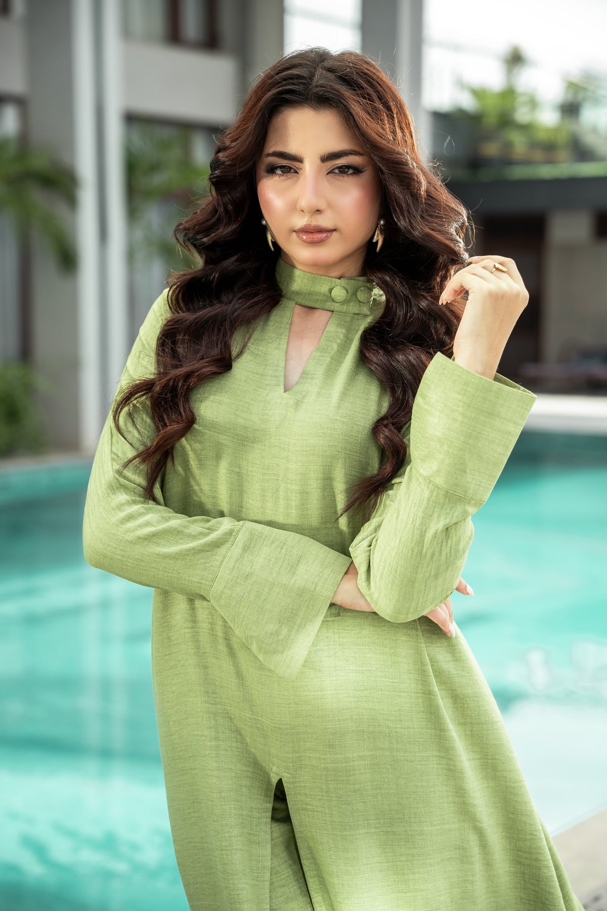 The Sage shirt from the waist up, showing the wide bell cuff and the mandarin collar.